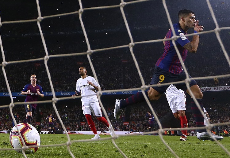 Barcelona's Luis Suarez warmed-up before the Champions League as he scores the penalty goal against Sevilla