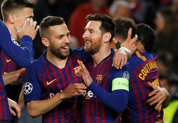 Lionel Messi scores twice to help Barcelona win their Champions League game against Lyon at Camp Nou