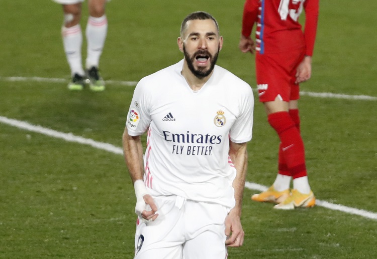 Karim Benzema scores a goal during Real Madrid’s La Liga win over Granada